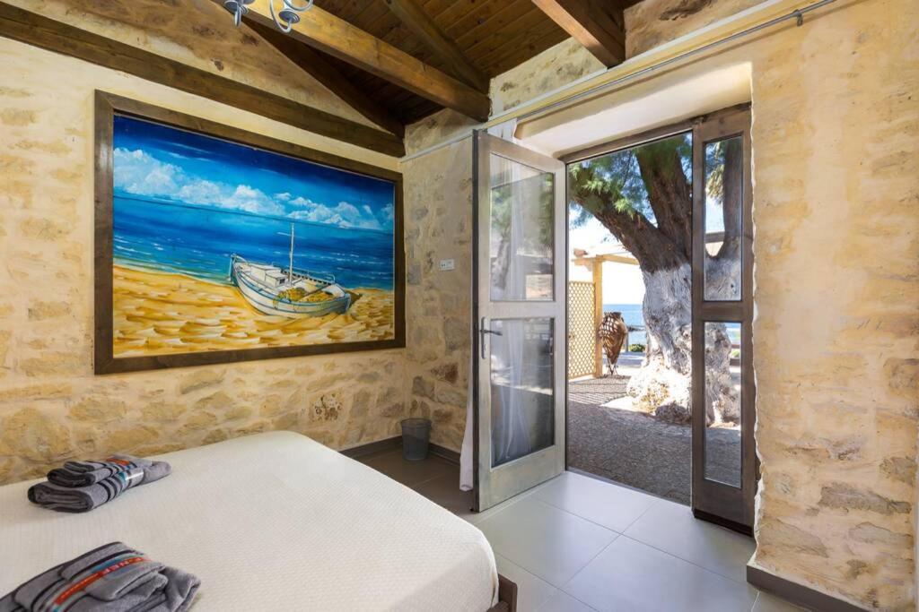 Villa Proto Helidoni - A Cozy Beachfront Villa Petres  Extérieur photo